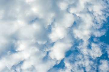 White, Fluffy Clouds In Blue Sky. Background From Clouds.