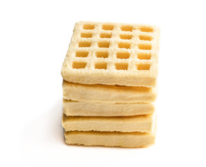 Stack of potato waffles isolated on white