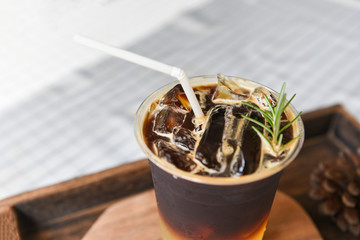 black coffee mix Orange syrup sparkling and rosemary - Iced americano Iced coffee with lemon orange juice and soda