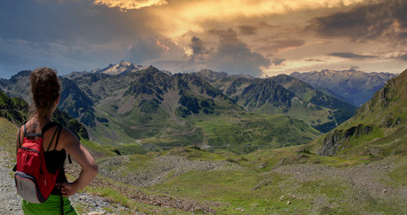 Fototapeta premium young woman looking Col du tourmalet in the french Pyrenees