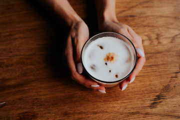 coffee, female hands holding a cup of coffee