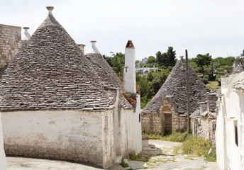Trullo along the street at Alberobello, Apulia, Italy