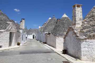 Trullo along the street in Rione Aia Piccola at Alberobello, Apulia, Italy