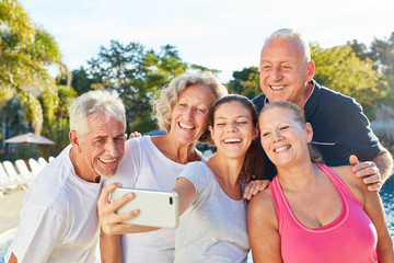 Tour group Senior makes selfie with tour guide