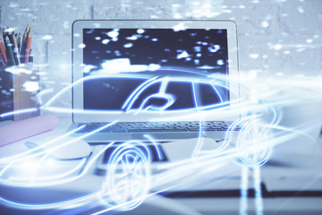 Desktop computer background in office with automobile hologram drawing. Multi exposure. Tech concept.