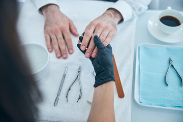 Close up of female hand that wearing gloves