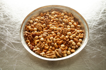 mixed nuts in copper plate