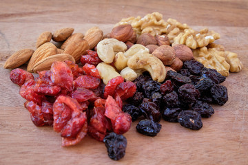 Close up of nuts in a wood surface