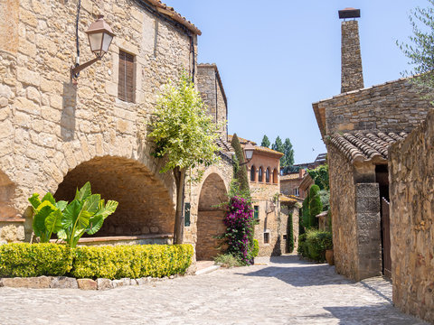 Fototapeta Medieval architecture street in Peratallada town in Catalonia, Spain