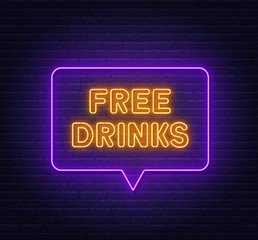 Free drinks neon sign in speech bubble frame on brick wall background .