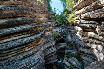 Fototapeta na wymiar Sedimentary rocks around water spring in Eastern Serbia, Rosomacki lonci