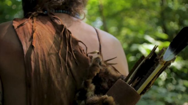 Rear view of Maya tribe member, slow motion