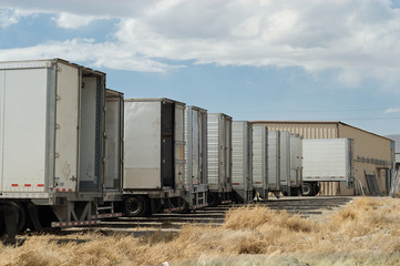 Fototapeta na wymiar Trucks parked with their backs open.