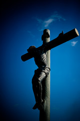 Fototapeta na wymiar Catholic church. Catholic Cross statue symbols.