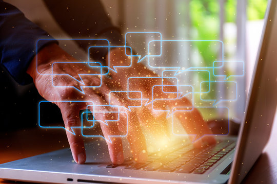 Lifestyle and technology concept  Close up man hands with laptop and bank chat boxs chart background. Man hands use computer network connect to social media around the world.