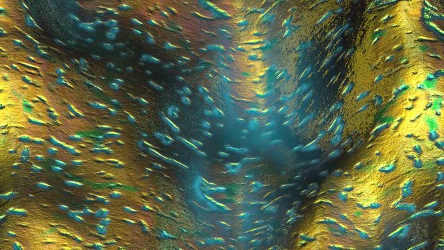 Seamless elegant animation of a gold and blue metal sheet. Hypnotic minimal wavy brass foil background.