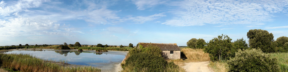 Fototapeta na wymiar Panorama of the Guerande salt marshes in Loire-Atlantique 