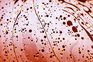 Beautiful psychedelic abstraction formed by light on the surface of a soap bubble