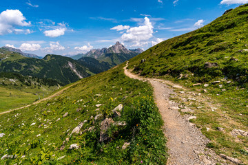 Naklejka premium Climbing the Karhorn Via Ferrata near Warth Schrocken in the Lechquellen Mountains