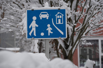 residential street sign, drive slow