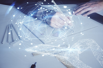 Man's hands working with notes background. Social networking scheme . Mixed media