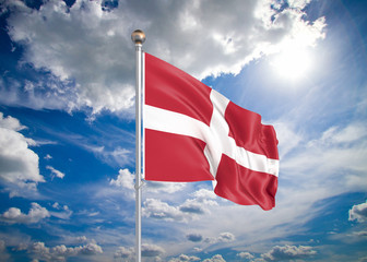 Realistic flag. 3D illustration. Colored waving flag of Denmark on sunny blue sky background.