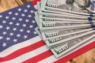 national flag of USA and dollar bills