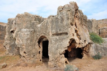 View of an ancient Tomb of the Kings necropolis with underground cave like graves in the city of Paphos (Pafos), Cyprus