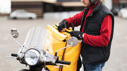 Unrecognizable Courier Opening Delivery Backpack With Food Outdoors, Cropped, Panorama