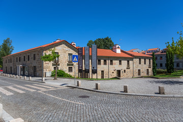 Fototapeta na wymiar iew at the exterior front and lateral facade Casa da Ribeira Museum on Viseu city Downtown