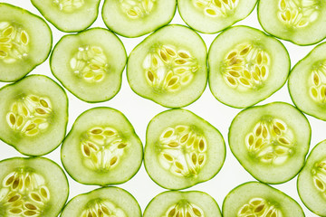 a sliced cucumber close up - textured background