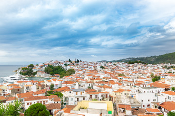 Fototapeta na wymiar Skiathos island, Greece, panoramic view of the town, on a cloudy summer day