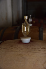 A wine barrel with an air trap, used to indicate when fermentation is complete