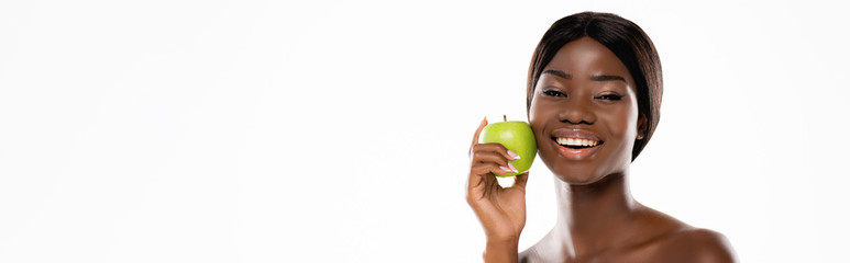 naked african american woman holding green ripe apple isolated on white, panoramic shot