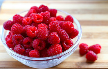 raspberry
Fresh ripe raspberries, macro photo of raspberry food. Background texture of ripe pink raspberries, close up on an old wooden table. Picture of a raspberry food product
