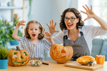 Happy family preparing for Halloween.