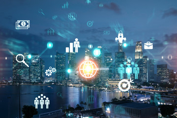 Technological development glowing icons. Night panoramic city view of Singapore. Concept of...