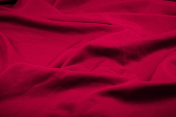 Closeup folds of wine-red drapery (with copyspace for text)