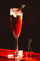 
Beautifully and festively decorated glass of wine on a black background