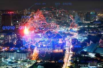 Hologram of Earth planet map on night panoramic cityscape of Kuala Lumpur, Malaysia, Asia. The concept of international companies in KL. Multi Exposure.