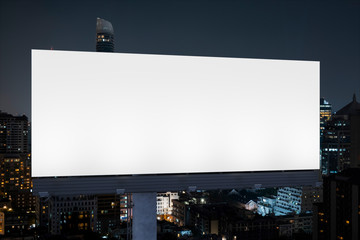 Blank white road billboard with Bangkok cityscape background at night time. Street advertising poster, mock up, 3D rendering. Front view. The concept of marketing communication to promote idea.
