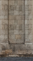 textured wall with stone columns in an old castle