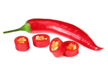 sliced red hot chili peppers isolated on white background