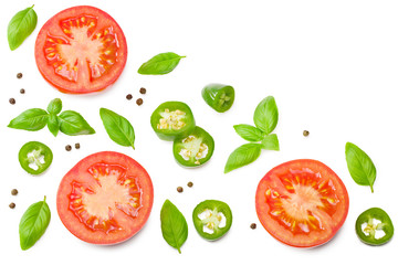 fresh tomato slices with green pepper and basil leaves isolated on white background. top view