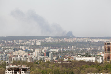 Obraz premium Burning church outside the city 
