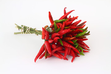 Bunch of fresh small red pepper isolated on white background