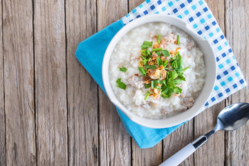 Breakfast rice porridge on a wooden table