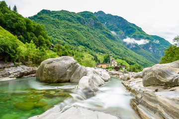 View from Bridge Ponte dei Salti to Verzasca River at Lavertezzo - clear and turquoise water stream...