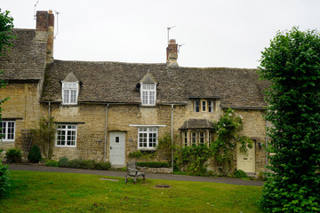 Fototapeta na wymiar Houses in Burford, Cotswolds, England 