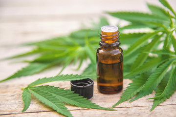 Cannabis extract in a small bottle. Selective focus.